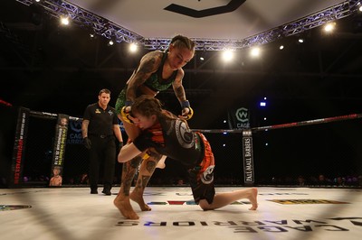 290918 - Cage Warriors 97 - Cory McKenna (Black Top) v Micol DiSegni (Green) - 