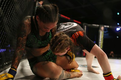 290918 - Cage Warriors 97 - Cory McKenna (Black Top) v Micol DiSegni (Green) - 