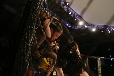 290918 - Cage Warriors 97 - Cory McKenna (Black Top) v Micol DiSegni (Green) - 