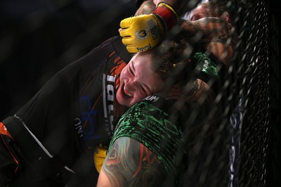 290918 - Cage Warriors 97 - Cory McKenna (Black Top) v Micol DiSegni (Green) - 