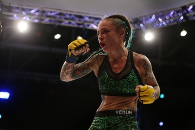 290918 - Cage Warriors 97 - Cory McKenna (Black Top) v Micol DiSegni (Green) - 