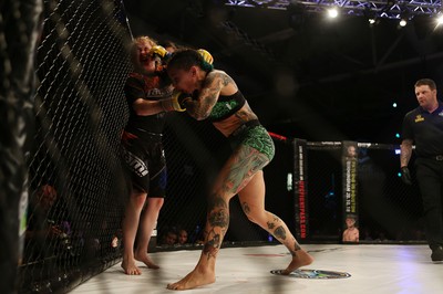 290918 - Cage Warriors 97 - Cory McKenna (Black Top) v Micol DiSegni (Green) - 