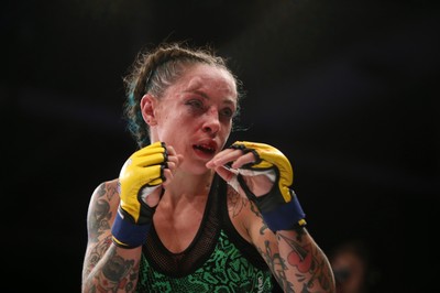 290918 - Cage Warriors 97 - Cory McKenna (Black Top) v Micol DiSegni (Green) - 