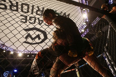 290918 - Cage Warriors 97 - Cory McKenna (Black Top) v Micol DiSegni (Green) - 