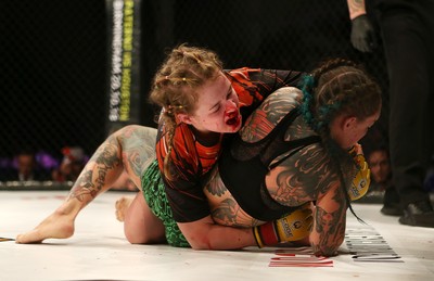 290918 - Cage Warriors 97 - Cory McKenna (Black Top) v Micol DiSegni (Green) - 