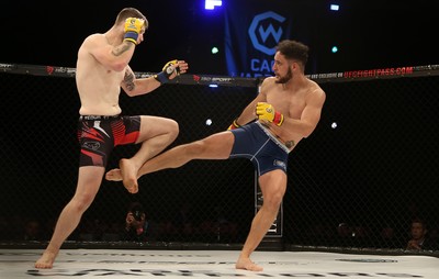 290918 - Cage Warriors 97 - Jamie Richardson (Black and red shorts) v Pontypridd's Aaron Khalid (Blue shorts)