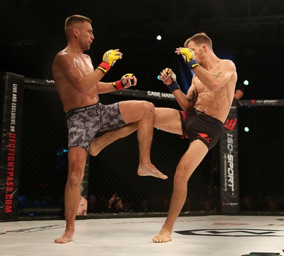 290918 - Cage Warriors 97 - Cardiff's Kris Edwards (Grey shorts) v Brian Bouland (Black shorts) - 