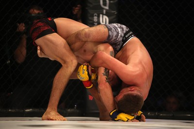 290918 - Cage Warriors 97 - Cardiff's Kris Edwards (Grey shorts) v Brian Bouland (Black shorts) - 