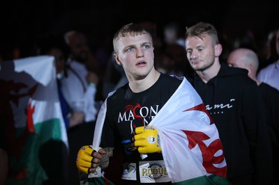 290918 - Cage Warriors 97 - Pontypool's Mason Jones (Black shorts) v Kasper Formela (Red shorts) - Jones makes his entrance