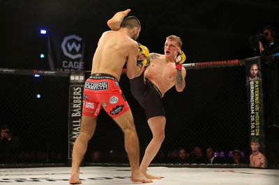 290918 - Cage Warriors 97 - Pontypool's Mason Jones (Black shorts) v Kasper Formela (Red shorts) - 