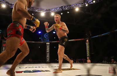 290918 - Cage Warriors 97 - Pontypool's Mason Jones (Black shorts) v Kasper Formela (Red shorts) - 