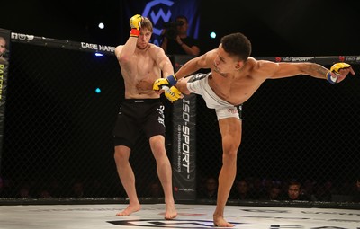 290918 - Cage Warriors 97 - Wales' Jack Shore (Black shorts) v Wesley Maia (White shorts) - 