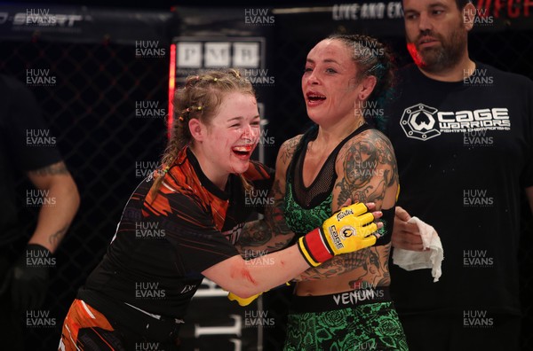 290918 - Cage Warriors 97 - Cory McKenna (Black Top) v Micol DiSegni (Green) - Smiles and hugs after the fight