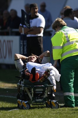 17.04.10 Carmarthen Quins RFC v Pontypridd RFC - Swalec Cup semi final - Pontypridd's aaron Bramwell shows his frustration as a serious leg injury ends his game early. 