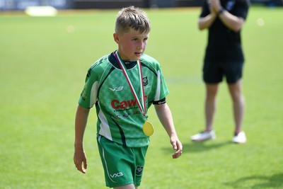 210525 - Carmarthen v Swansea - WSRU Junior Group - U11s DC Thomas Plate Final - Carmarthen players celebrate the win at full time