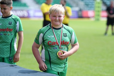 210525 - Carmarthen v Swansea - WSRU Junior Group - U11s DC Thomas Plate Final - Carmarthen players celebrate the win at full time