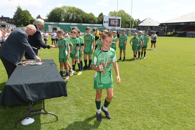210525 - Carmarthen v Swansea - WSRU Junior Group - U11s DC Thomas Plate Final - Carmarthen players celebrate the win at full time