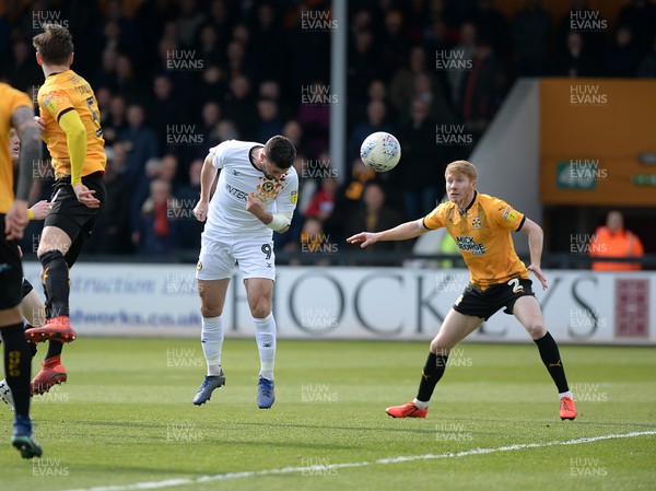 130419 - Cambridge United v Newport County - Sky Bet League 2 - Newport's Padraig Amond heads in the first goal and celebrates 