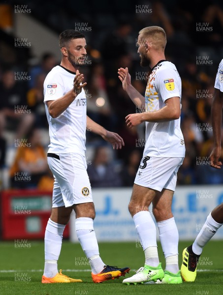 140818 - Cambridge United v Newport County - EFL Cup - Padraig Amond of Newport County celebrates his first goal with Dan Butler