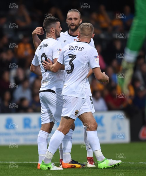 140818 - Cambridge United v Newport County - EFL Cup - Padraig Amond of Newport County celebrates his first goal with team mates