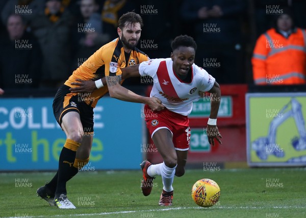 161217 - Cambridge United v Newport County, Sky Bet League 2 - Shawn McCoulsky of Newport County is brought down by Greg Taylor of Cambridge United
