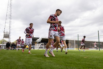 300825 - Cambridge United v Newport County - Sky Bet League 2 - Newport County players warming up before the match