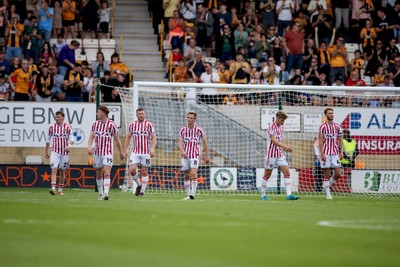 300825 - Cambridge United v Newport County - Sky Bet League 2 - Newport Players dejected after Cambridge United’s Kelland Watts scores his sides first goal
