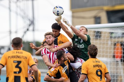300825 - Cambridge United v Newport County - Sky Bet League 2 - Cambridge United’s Jake Eastwood punches the ball away 