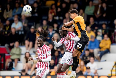 300825 - Cambridge United v Newport County - Sky Bet League 2 - Newport County’s Michael Reindorf, Newport County’s Cameron Antwi and Cambridge United’s Mamadou Jobe battle for the ball