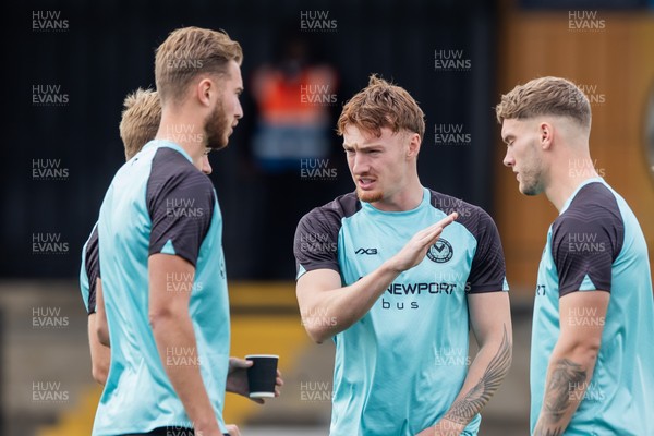 300825 - Cambridge United v Newport County - Sky Bet League 2 - Newport County Michael Spellman with team mates before the match 