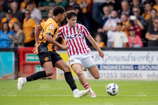 300825 - Cambridge United v Newport County - Sky Bet League 2 - Newport County’s Anthony Driscoll-Glennon and Cambridge United’s Mamadou Jobe