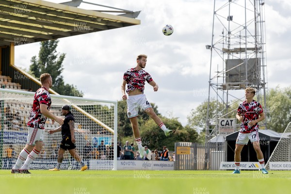 300825 - Cambridge United v Newport County - Sky Bet League 2 - Newport County’s Lee Jenkins, Newport County’s Matthew Smith and Newport County’s Tom Davies 