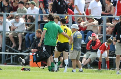 30.05.09 - Canada v Wales - Wales' Gareth Cooper is helped from the field at half time. 
