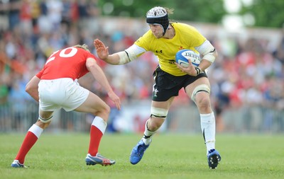 30.05.09 - Canada v Wales - Wales' Ryan Jones takes on Canada's Matt Evans. 