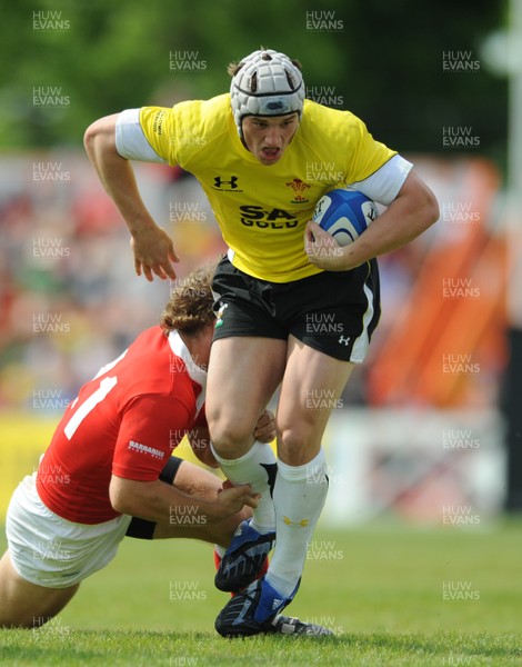 30.05.09 - Canada v Wales - Wales' Jonathan Davies is tackled by Canada's David Spicer. 