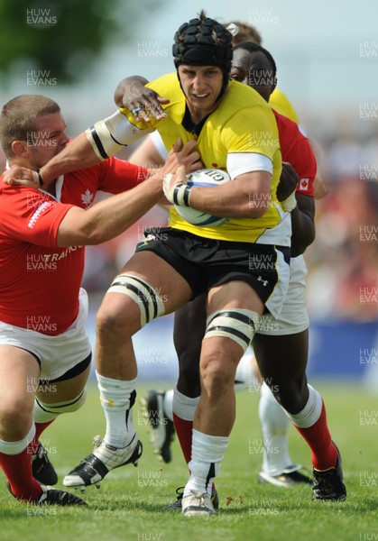 30.05.09 - Canada v Wales - Wales' Robin Sowden-Taylor is held by the Canadian defence. 
