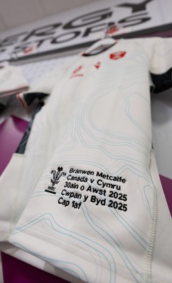 300825 - Canada v Wales, Women’s Rugby World Cup - Branwen Metcalfe of Wales’ match shirt in the Wales team changing room set for her first cap against Canada