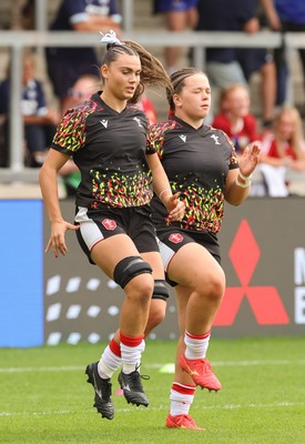 300825 - Canada v Wales, Women’s Rugby World Cup - Bryonie King of Wales and Maisie Davies of Wales during warm up ahead of the match