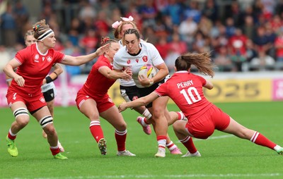 300825 - Canada v Wales, Women’s Rugby World Cup - Courtney Keight of Wales takes on Taylor Perry of Canada