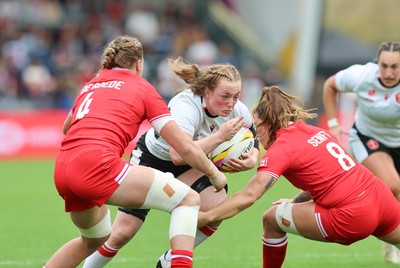 300825 - Canada v Wales, Women’s Rugby World Cup - Abbie Fleming of Wales takes on Gabrielle Senft of Canada