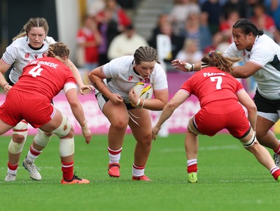 300825 - Canada v Wales, Women’s Rugby World Cup - Maisie Davies of Wales takes on Karen Paquin of Canada