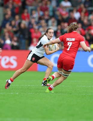 300825 - Canada v Wales, Women’s Rugby World Cup - Nel Metcalfe of Wales takes on Karen Paquin of Canada