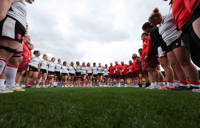 300825 - Canada v Wales, Women’s Rugby World Cup - The Wales team huddle up at the end of the match