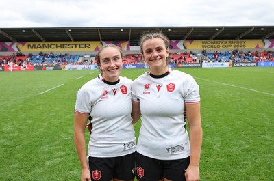 300825 - Canada v Wales, Women’s Rugby World Cup - Sisters Nel Metcalfe of Wales and Branwen Metcalfe of Wales at the end of the match