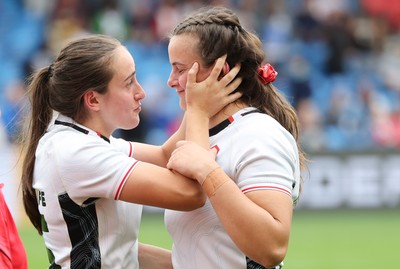 300825 - Canada v Wales, Women’s Rugby World Cup - Nel Metcalfe of Wales congratulates sister Branwen Metcalfe of Wales on her first cap at the end of the match
