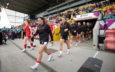 300825 - Canada v Wales, Women’s Rugby World Cup - Kayleigh Powell of Wales and Jasmine Joyce-Butchers of Wales walk out at the start of the match