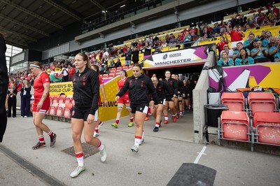 300825 - Canada v Wales, Women’s Rugby World Cup - Carys Cox of Wales and Jenni Scoble of Wales walk out at the start of the match