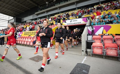 300825 - Canada v Wales, Women’s Rugby World Cup - Molly Reardon of Wales and Maisie Davies of Wales walk out at the start of the match