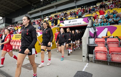 300825 - Canada v Wales, Women’s Rugby World Cup - Nel Metcalfe of Wales and Branwen Metcalfe of Wales walk out at the start of the match