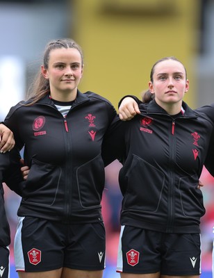 300825 - Canada v Wales, Women’s Rugby World Cup - Sisters Branwen Metcalfe of Wales, left, and Nel Metcalfe of Wales line up for the anthems